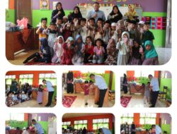 Kepala Kampung SRiwijaya umpu semenguk antoni Nasir membagikan asupan Gizi kepada Taman Kanak Kanak (TK) Sriwijaya
