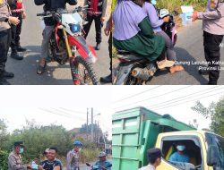 Cegah Gangguan Pernapasan Akibat Abu Vulkanik, Polisi di Way Kanan Bagikan Masker kepada Masyarakat